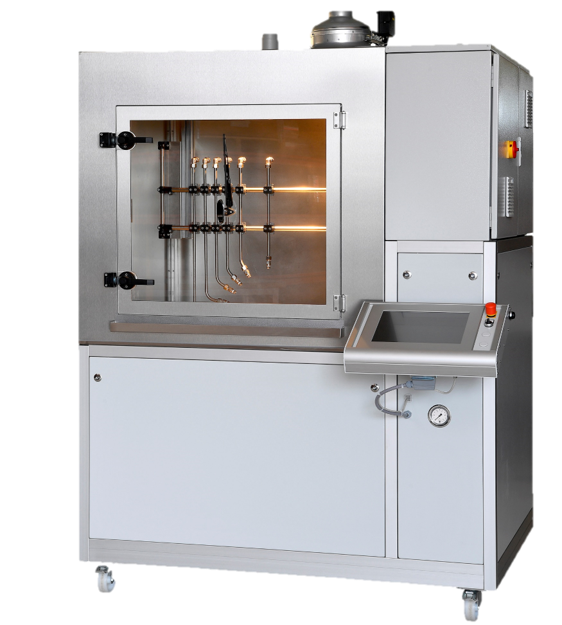 Kammer für Spritzwassertest mit Sichtfenster und Blick auf die Düsen